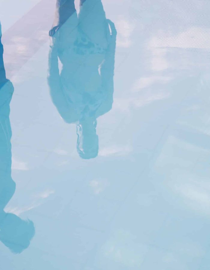 shadows-couple-by-pool shadows-couple-by-pool